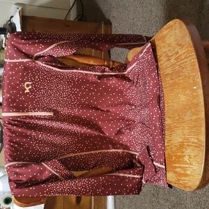 A Kari Traa, believed to a base layer. Brown and peach in color. Size small